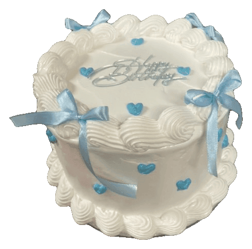 White vintage-style birthday cake with light blue satin bows and a silver Happy Birthday topper, made in Townsville