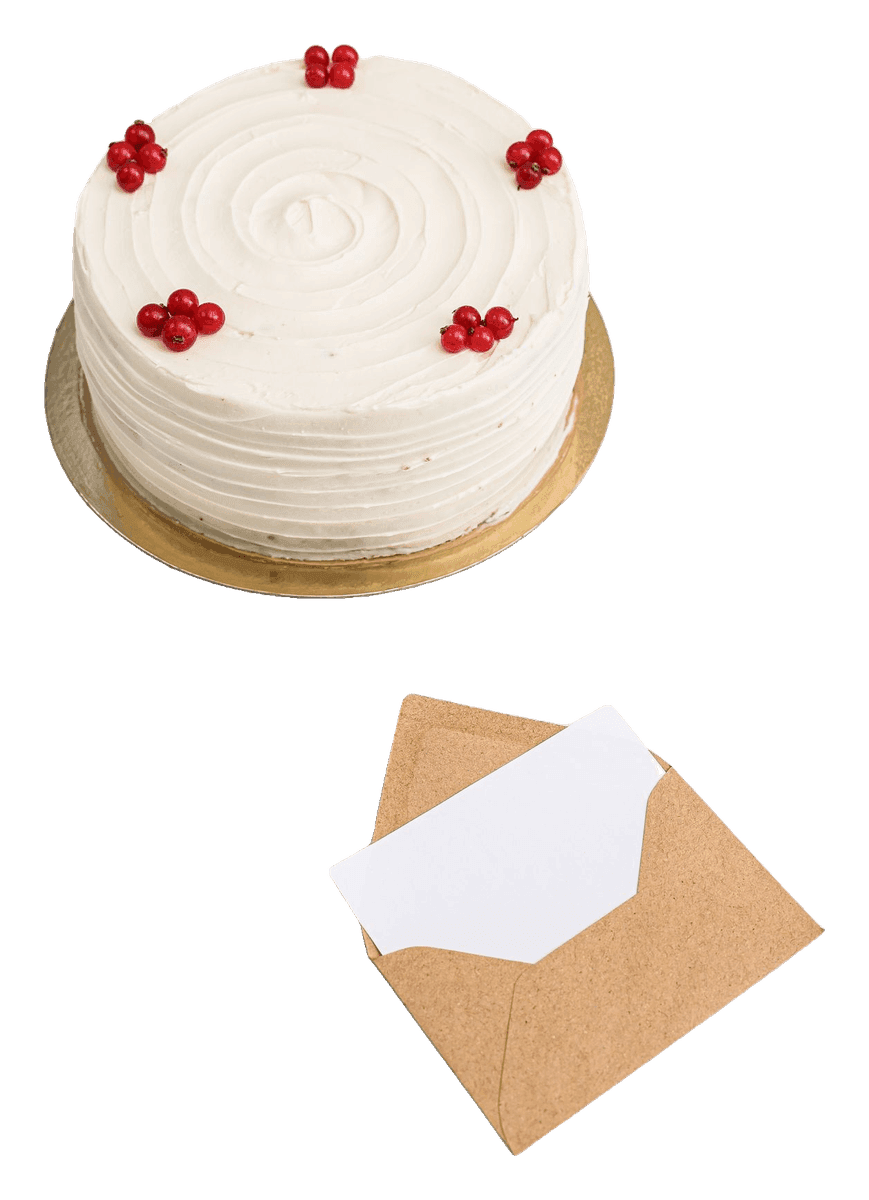 White buttercream cake with redcurrants beside a kraft envelope and blank card