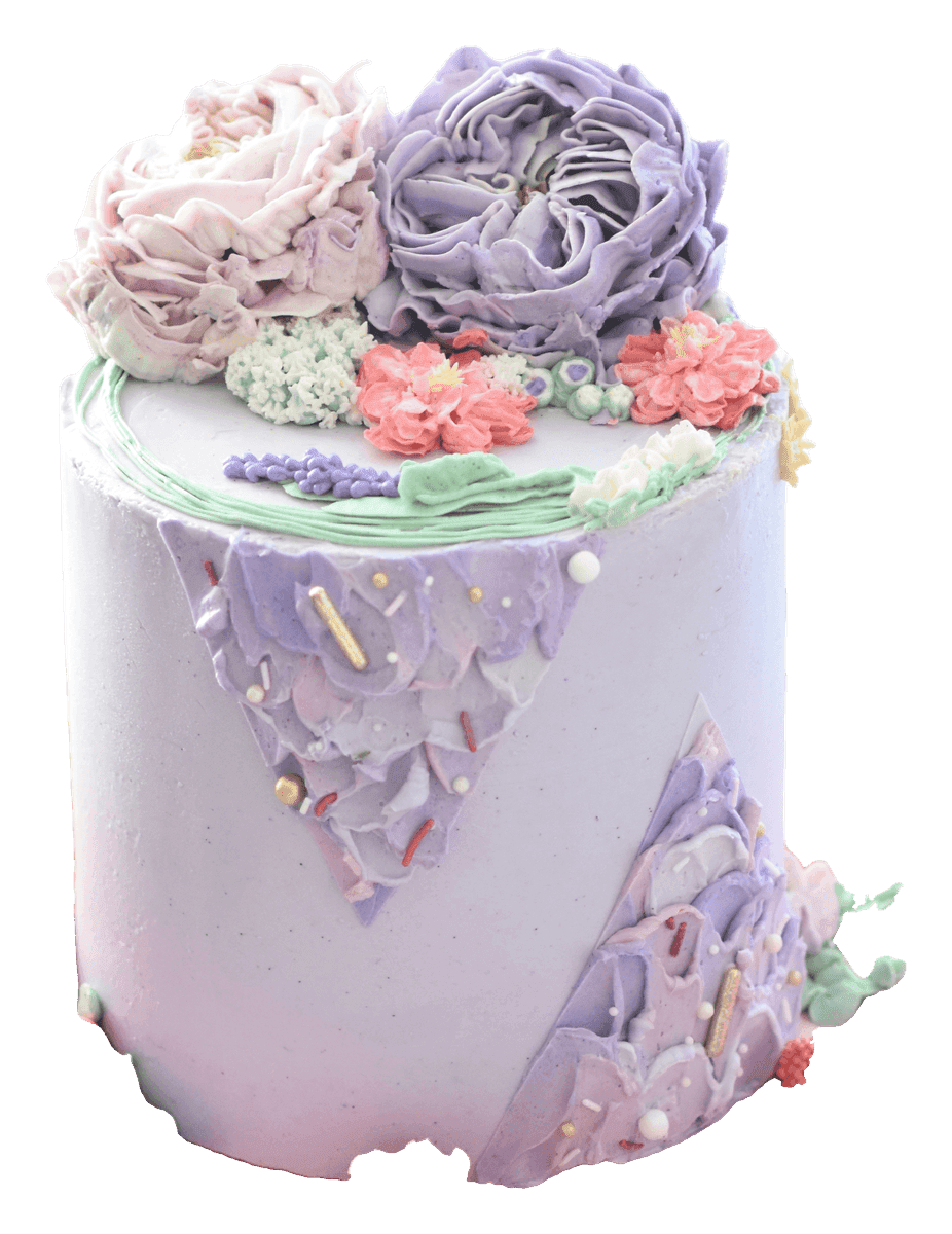 Lilac buttercream cake topped with piped pastel flowers