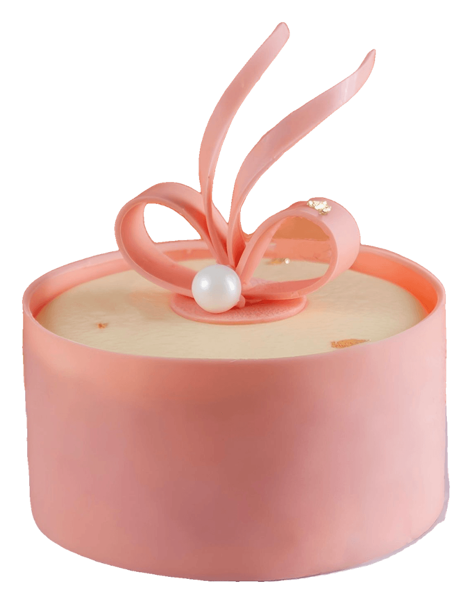 Peach cake with sugar ribbon loops and a pearl on top