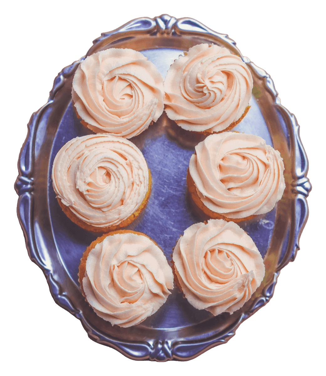 Six cupcakes with peach rosette buttercream on a silver serving tray